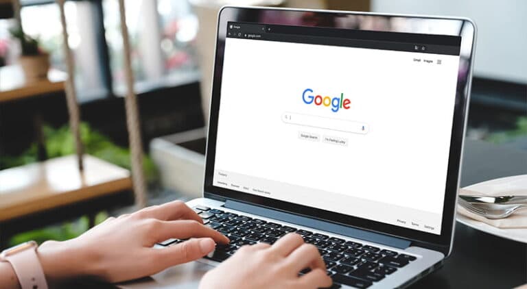 women using google on a laptop computer